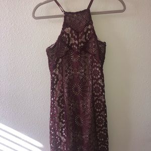 Beige dress with maroon lace over it